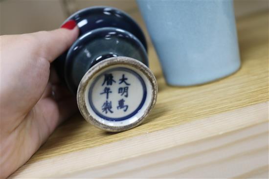 A Chinese blue-glazed stem cup, a yellow vase and a claire de lune glazed meiping